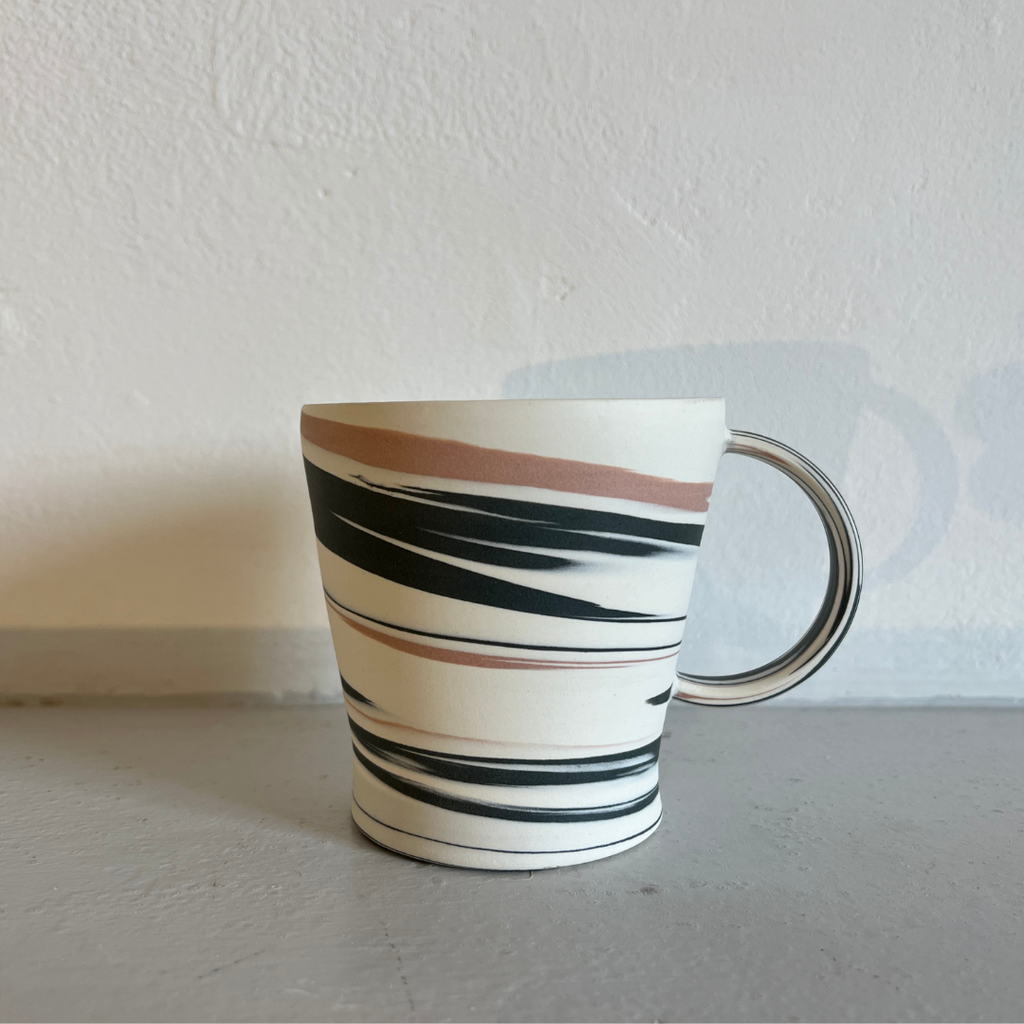 Polished Porcelain Cup With Black And Pink Swirls