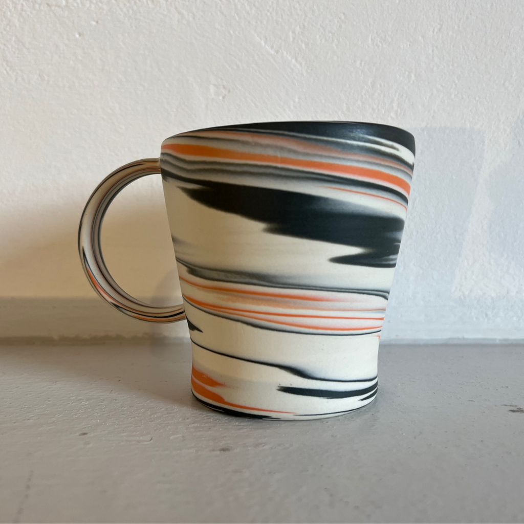Polished Porcelain Cup With Orange And Blue/Grey Swirls
