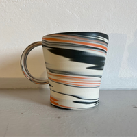 Polished Porcelain Cup With Orange And Blue/Grey Swirls