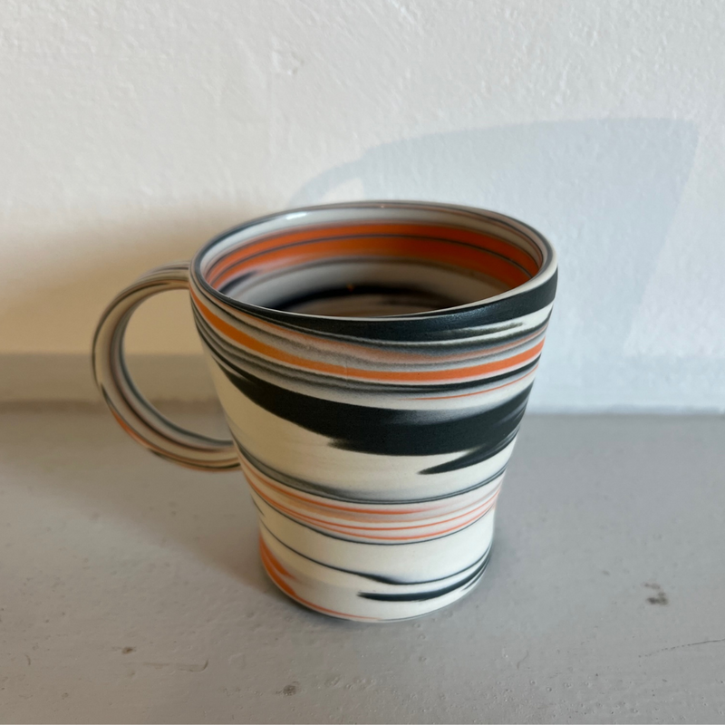 Polished Porcelain Cup With Orange And Blue/Grey Swirls