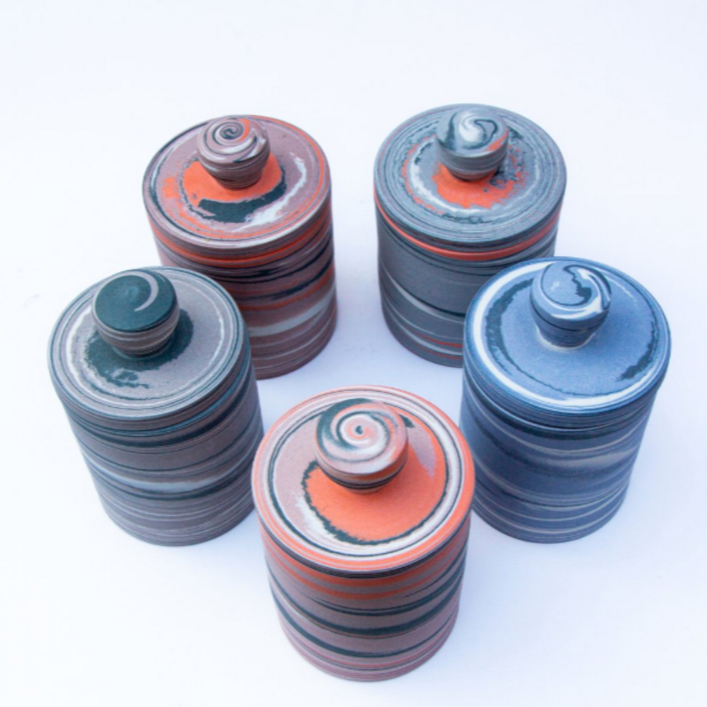 Polished Porcelain Lidded Vessel With Black, Orange and Pink Swirls