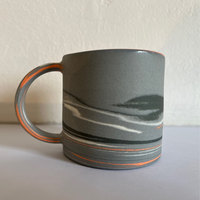 Polished Expresso Mug With Grey, orange And Black Swirls