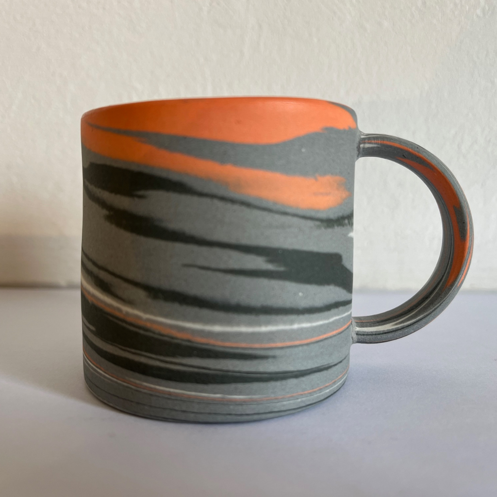 Polished Expresso Mug With Grey, orange And Black Swirls