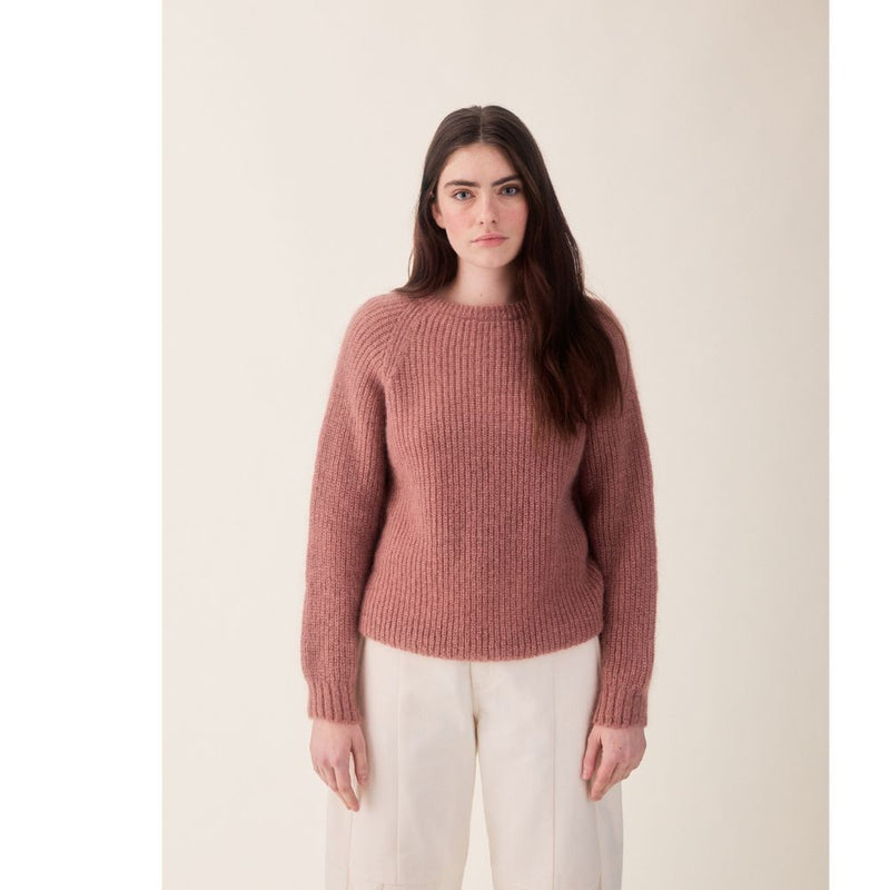 A woman modelling the Sideline Flo Jumper in Dusky Rose - Front