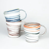 Polished Porcelain Cup With Blue And White Swirls